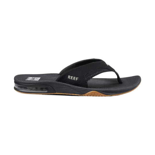 Black thong sandal with a cushioned footbed, visible heel air pod, and REEF logo on the strap