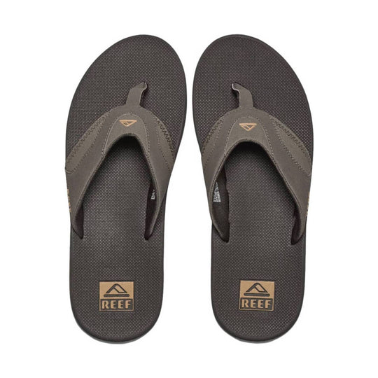 Brown thong sandals with textured footbeds and REEF logos