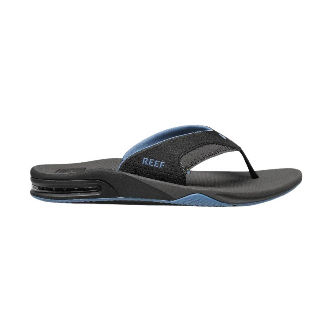 Black and gray flip flop sandal with blue accents and a visible air-cushion heel