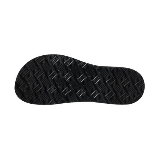 Black textured sandal outsole with zigzag tread pattern