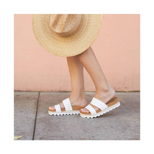 White two-strap platform slide sandal with tan footbed and lug sole