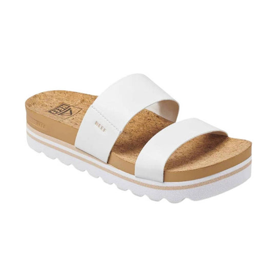 White platform slide sandal with cork footbed and thick contoured sole