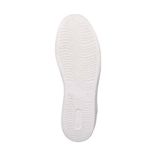 White sneaker outsole with wavy tread pattern and embossed branding near the heel