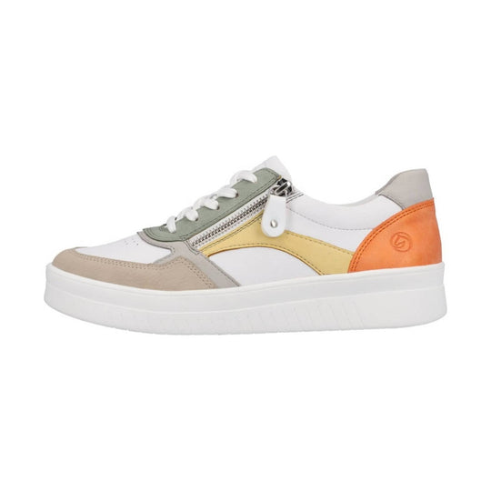 White low-top sneaker with beige, sage green, yellow, and orange panels, side zipper, and thick white sole
