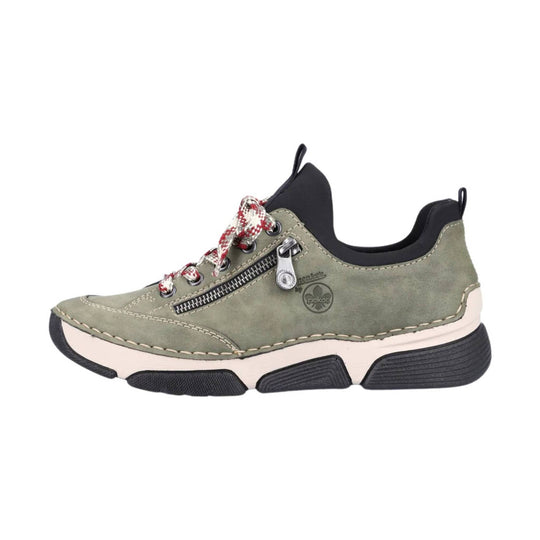 Olive green low-top sneaker with side zipper, red-and-white laces, and thick black-and-white sole