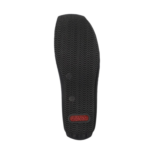 Black textured shoe sole with wavy tread and a red Ricker logo patch