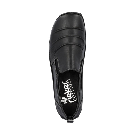 Black slip-on loafer with stitched panels and a visible branded insole