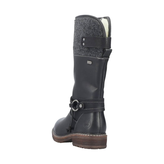 Black tall winter boot with gray felt shaft, shearling lining, strap buckles, and wood-look heel
