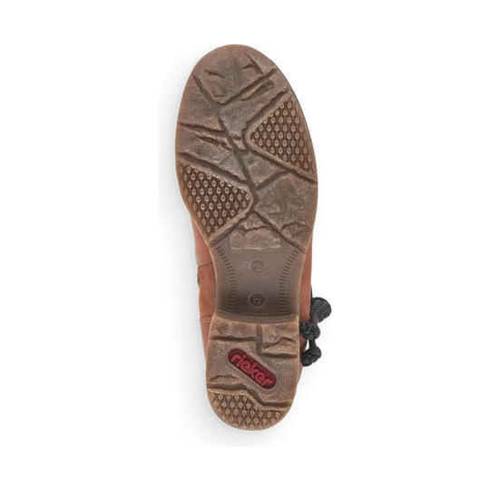 Tan boot sole with rugged tread and red Rieker logo