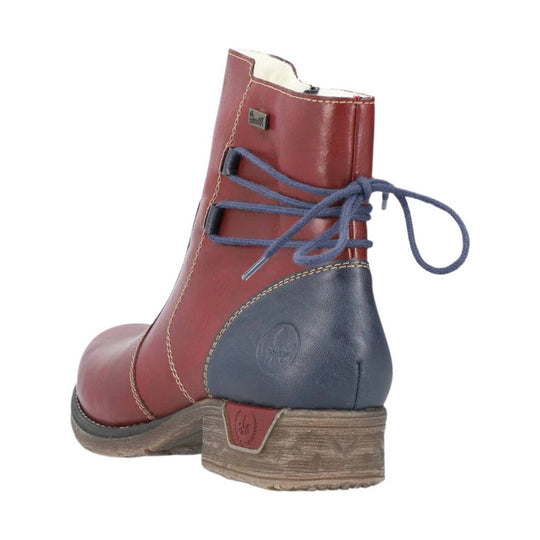 Burgundy ankle boot with navy heel panel, blue laces, and tan stitched sole