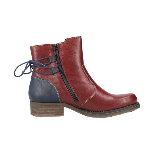 Red leather ankle boot with navy heel, side zipper, and blue wraparound laces