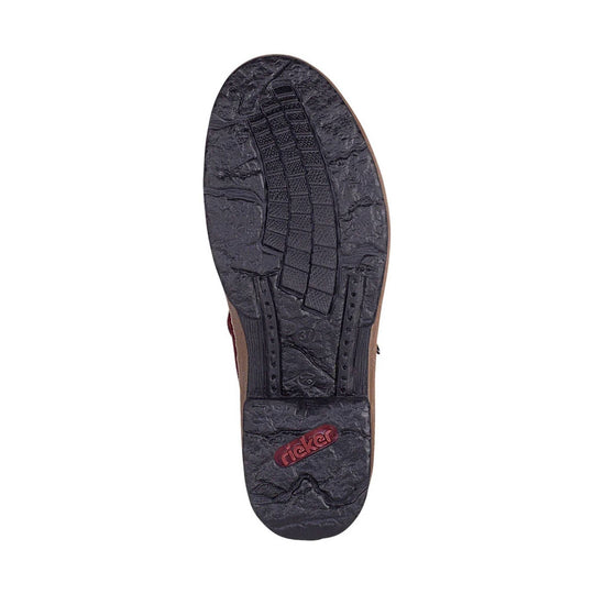 Black boot outsole with textured tread and red rieker logo