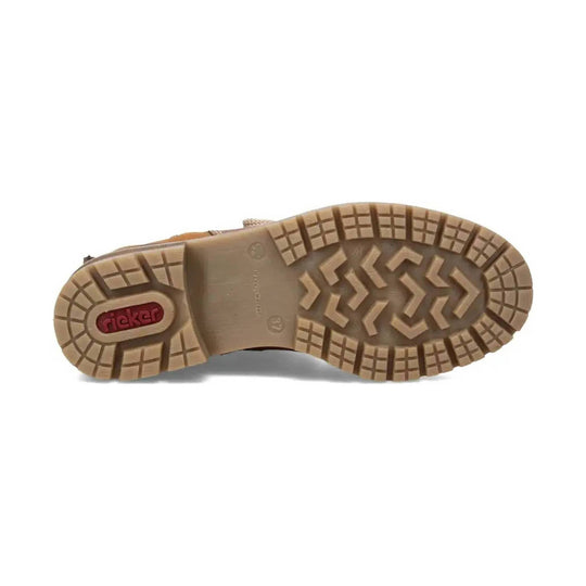 Tan boot sole with lug tread and red rieker logo