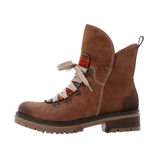 Brown leather ankle boot with cream laces, colorful woven eyelet accents, and a lug sole