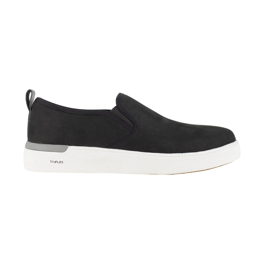 Black slip-on shoe with white sole and pull tab, side view