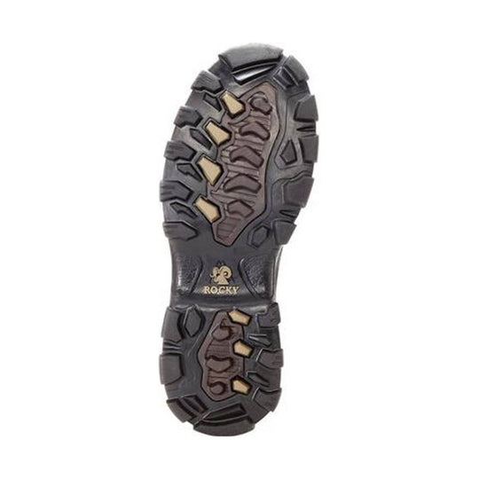Outsole of a rugged hiking boot with deep tread and small ROCKY logo