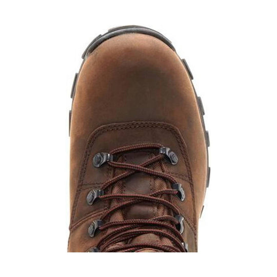 Brown leather hiking boot with round toe, speed laces, and rugged black outsole