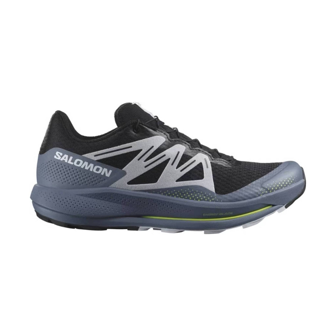 Black trail running shoe with gray overlays and a blue-gray sole, side view