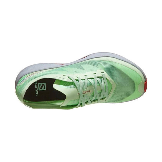 Light green Salomon running shoe with white laces, translucent upper, and gray sole, shown from above