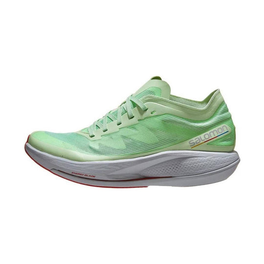 Light green running shoe with mesh upper, laces, and white foam sole