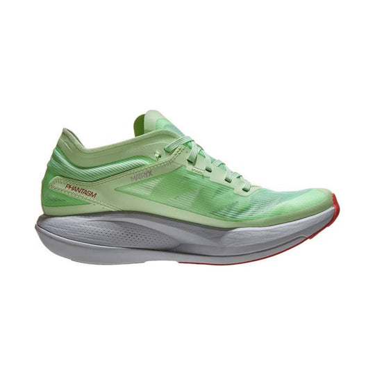 Light green running shoe with mesh upper, thick gray sole, and red toe accent