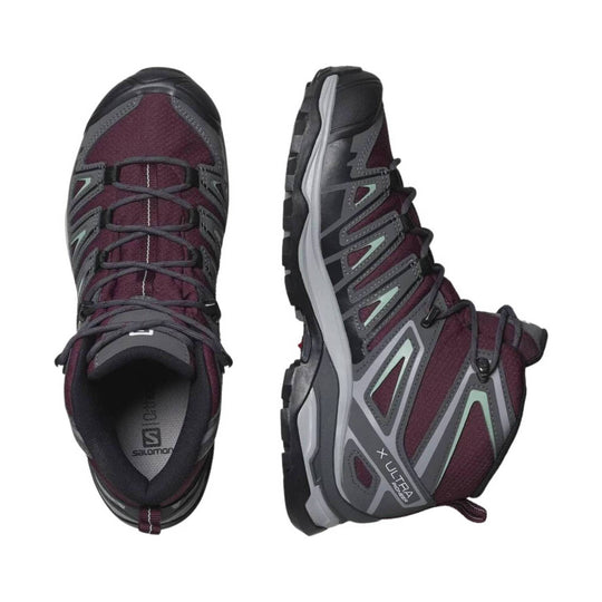 Maroon and gray mid hiking boots shown from top and side, with bungee laces and rugged soles.