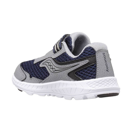 Navy and gray kids' athletic sneaker with white sole and Saucony logo on the heel