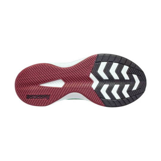 Shoe outsole with red forefoot and black heel tread, featuring the Saucony logo