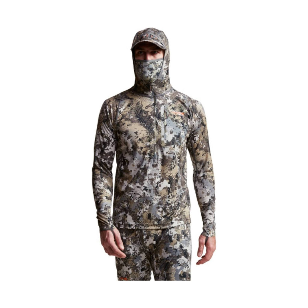 Camouflage long-sleeve hooded top with face covering and matching pants, front view