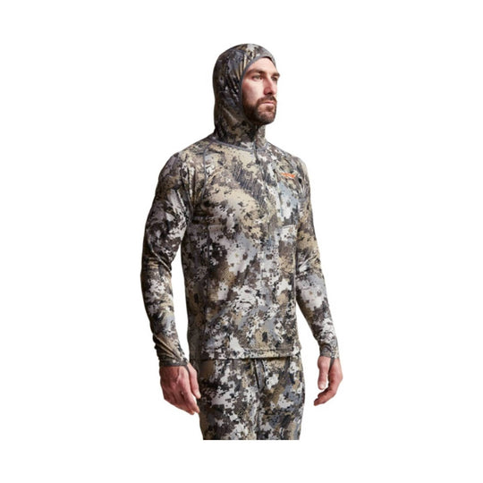 Camouflage hooded long-sleeve performance top with a quarter-zip front