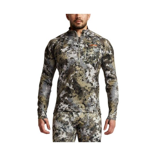 Camouflage long-sleeve quarter-zip base layer shirt with a chest zipper pocket