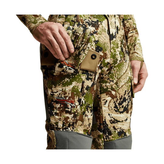 Camouflage hunting pants with cargo pockets and gray reinforced knee panels