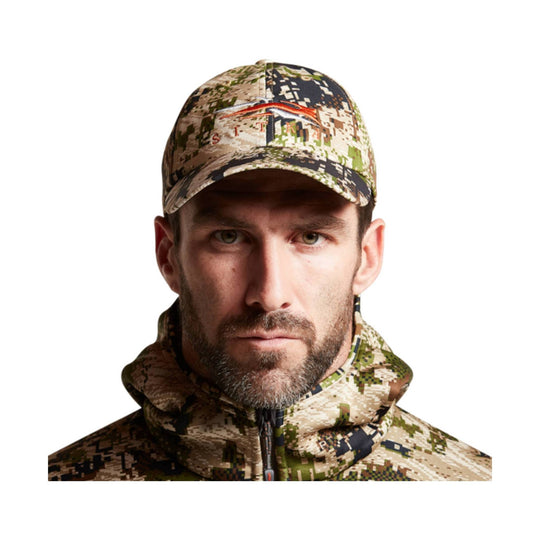 Camouflage baseball cap and matching zip-up jacket shown front-facing on a man