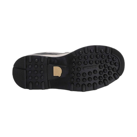 Black boot outsole with lugged rubber tread and a Sorel logo plate