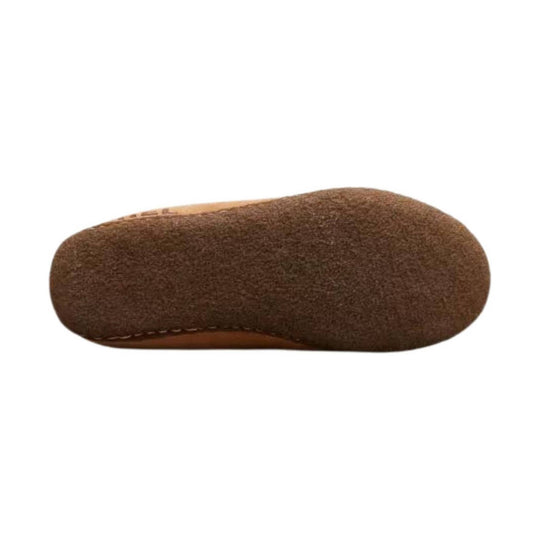 Brown suede slipper shown from the sole