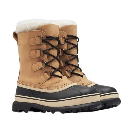 Tan winter boots with white faux-fur cuffs, black laces, and thick black lug soles