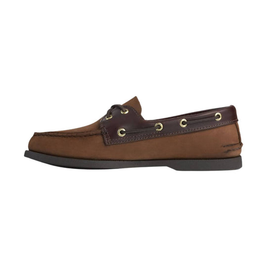 Brown leather boat shoe with dark trim, gold eyelets, and a black sole