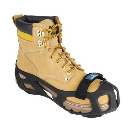Tan work boot with black rubber toe guard, yellow laces, and metal traction cleats on the sole