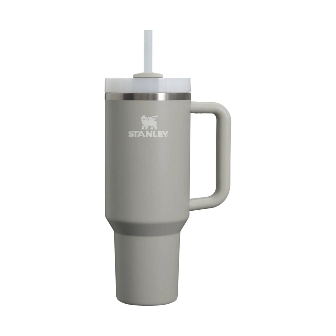 Gray handled stainless steel tumbler with straw lid and Stanley logo