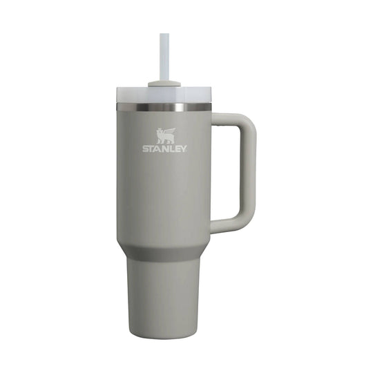 Gray handled stainless steel tumbler with straw lid and Stanley logo
