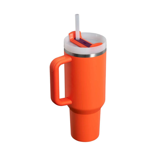 Orange insulated tumbler with handle, clear straw lid, and metal accent ring