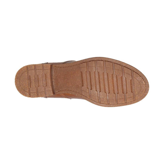 Brown shoe outsole with lugged tread and rectangular traction grooves