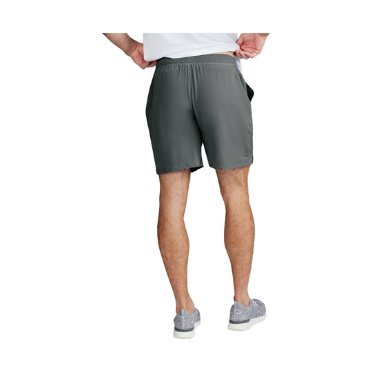 Gray athletic shorts on a model, shown from the back with an elastic waistband and built-in liner