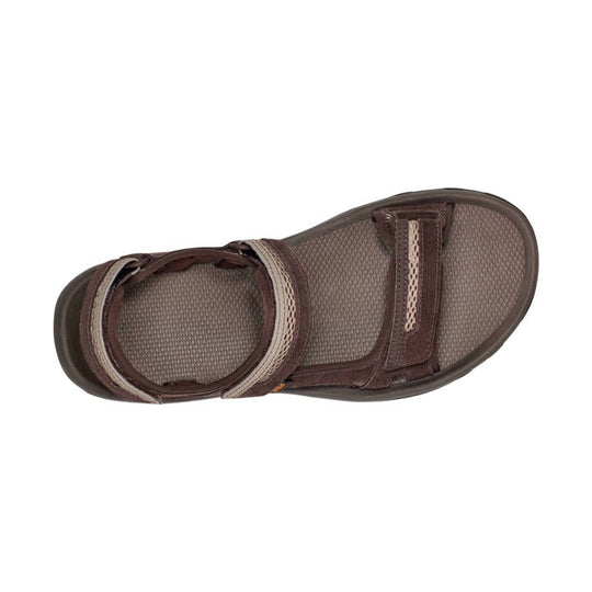 Brown closed-toe sandal with adjustable straps and textured footbed, top view