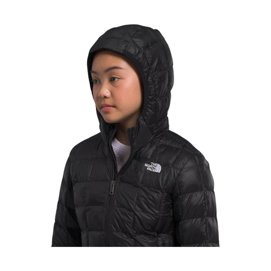 Black hooded quilted puffer jacket with front zipper and logo on chest
