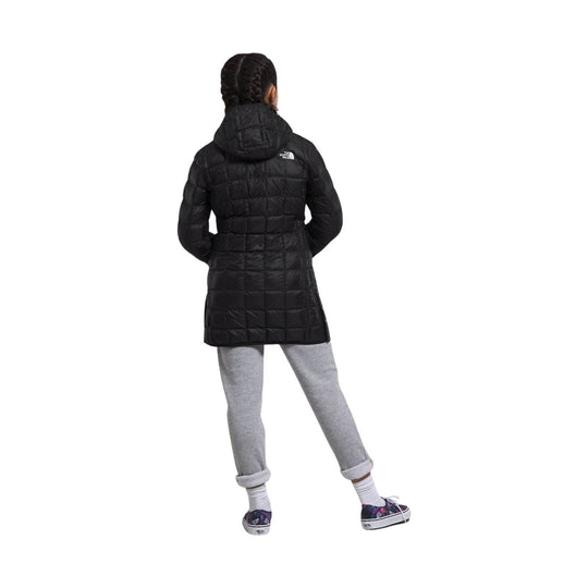 Black quilted hooded parka shown from the back with a small logo on the upper back.