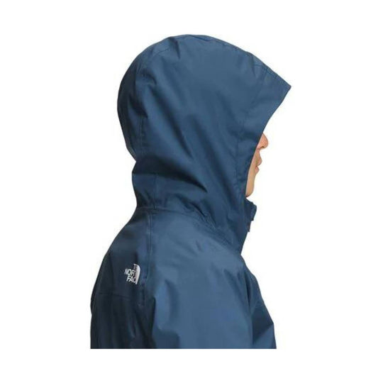 Blue hooded kids' rain jacket shown in side profile