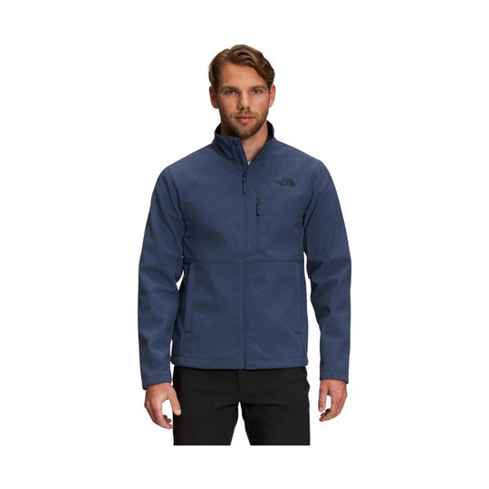 Blue zip-up fleece jacket with stand collar, chest logo, and zippered chest pocket