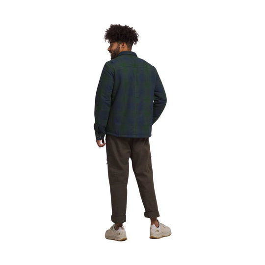 Dark plaid long-sleeve shirt jacket shown from the back, with buttoned cuffs and a collar