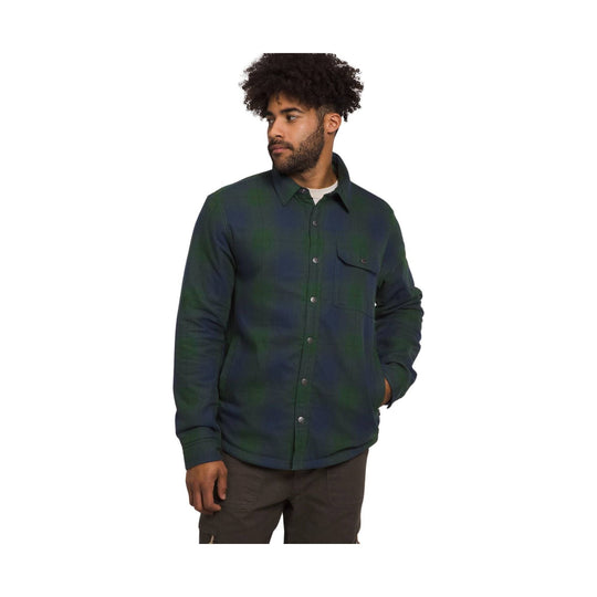 Dark green and navy plaid button-up shirt with a chest pocket and long sleeves